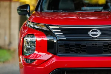 A Nissan wearing Mitsubishi’s iconic Red Diamond paint is a bit of a mind-bender.