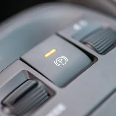 Cars with a button or switch instead of a lever use an electronic parking brake